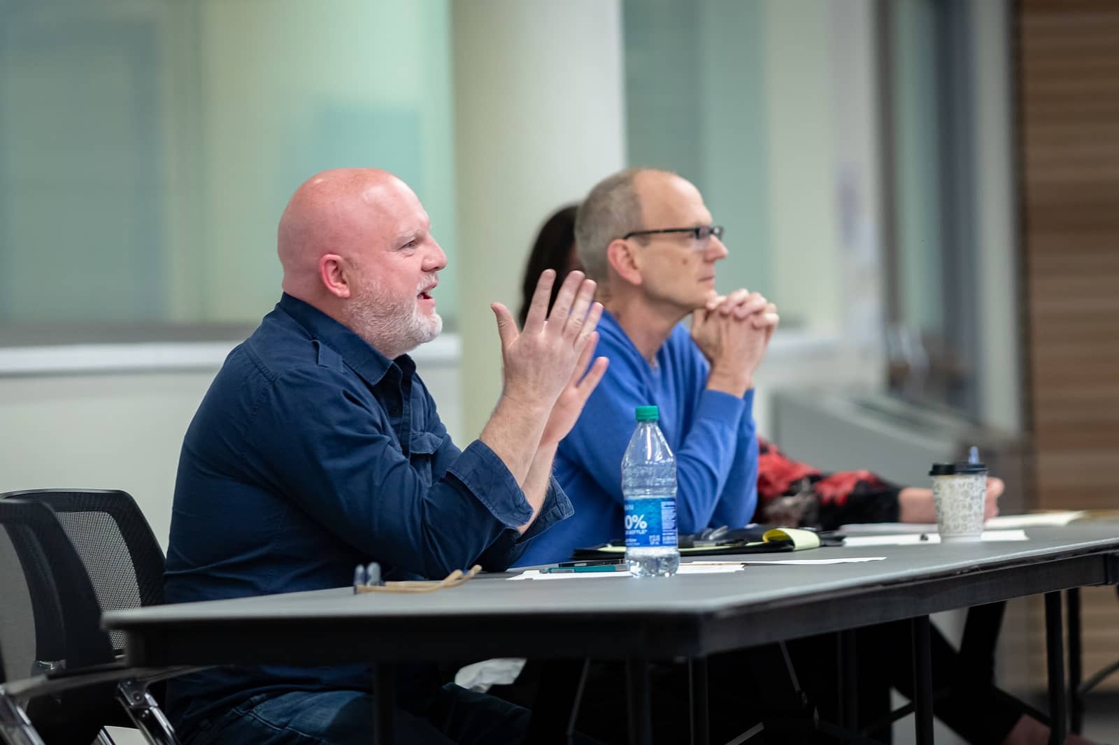 Judges provide feedback to students at a Business Competition Team event.