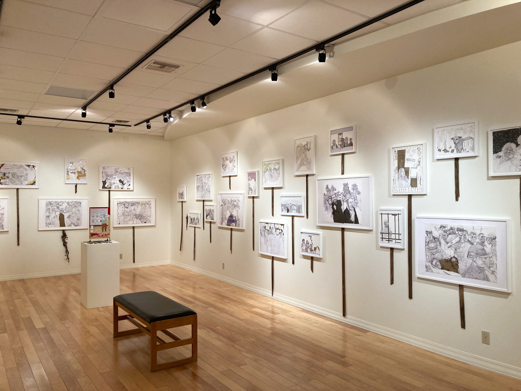 Artwork hangs on the wall in the Greg Hardwick Gallery.